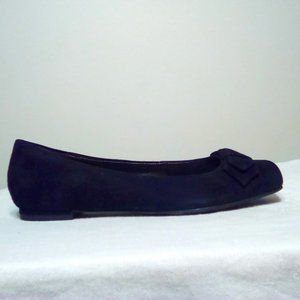 Black suede flats with bow detail